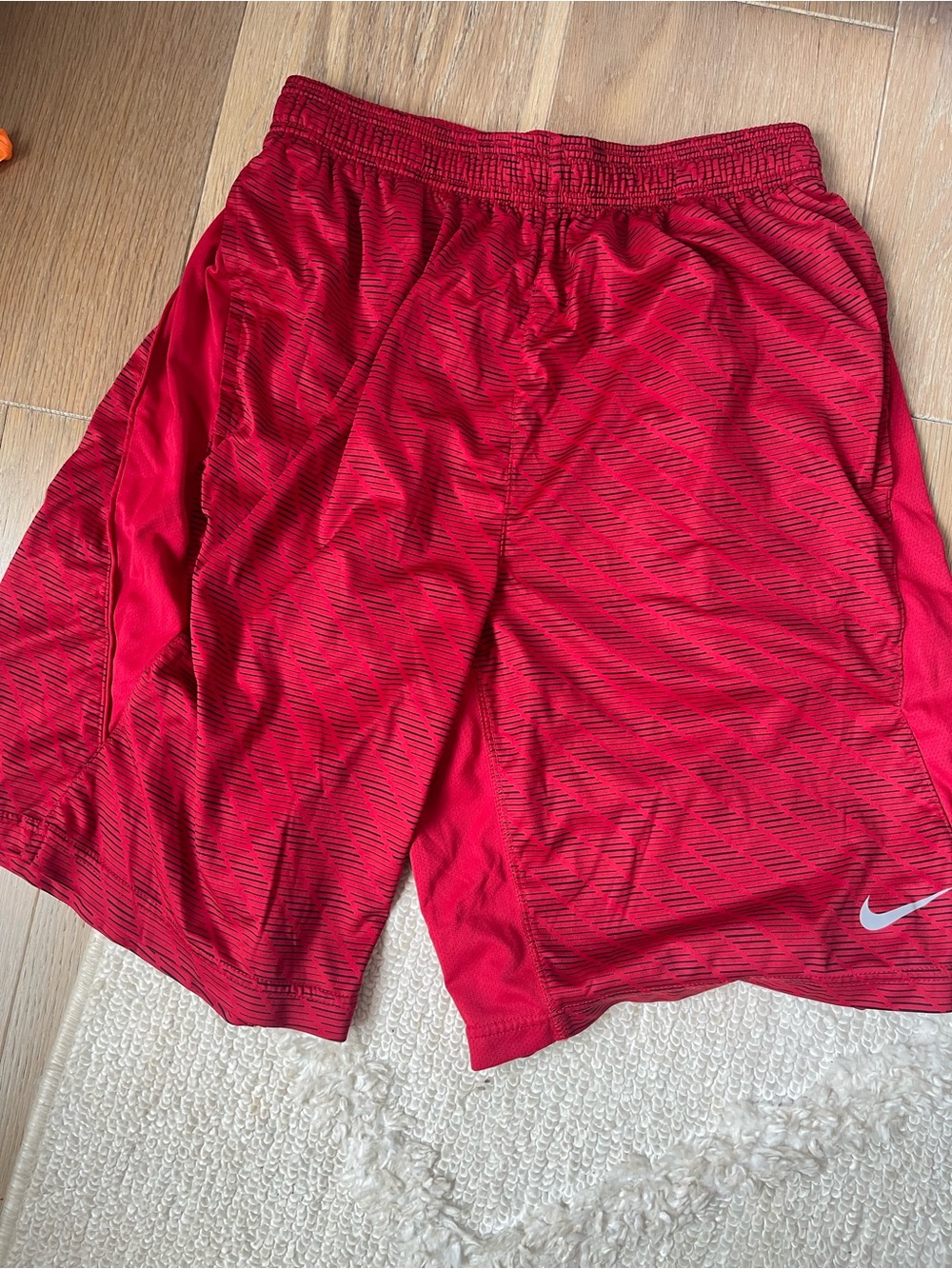 Nike Men’s Red Athletic Shorts with Black Stripe Accent